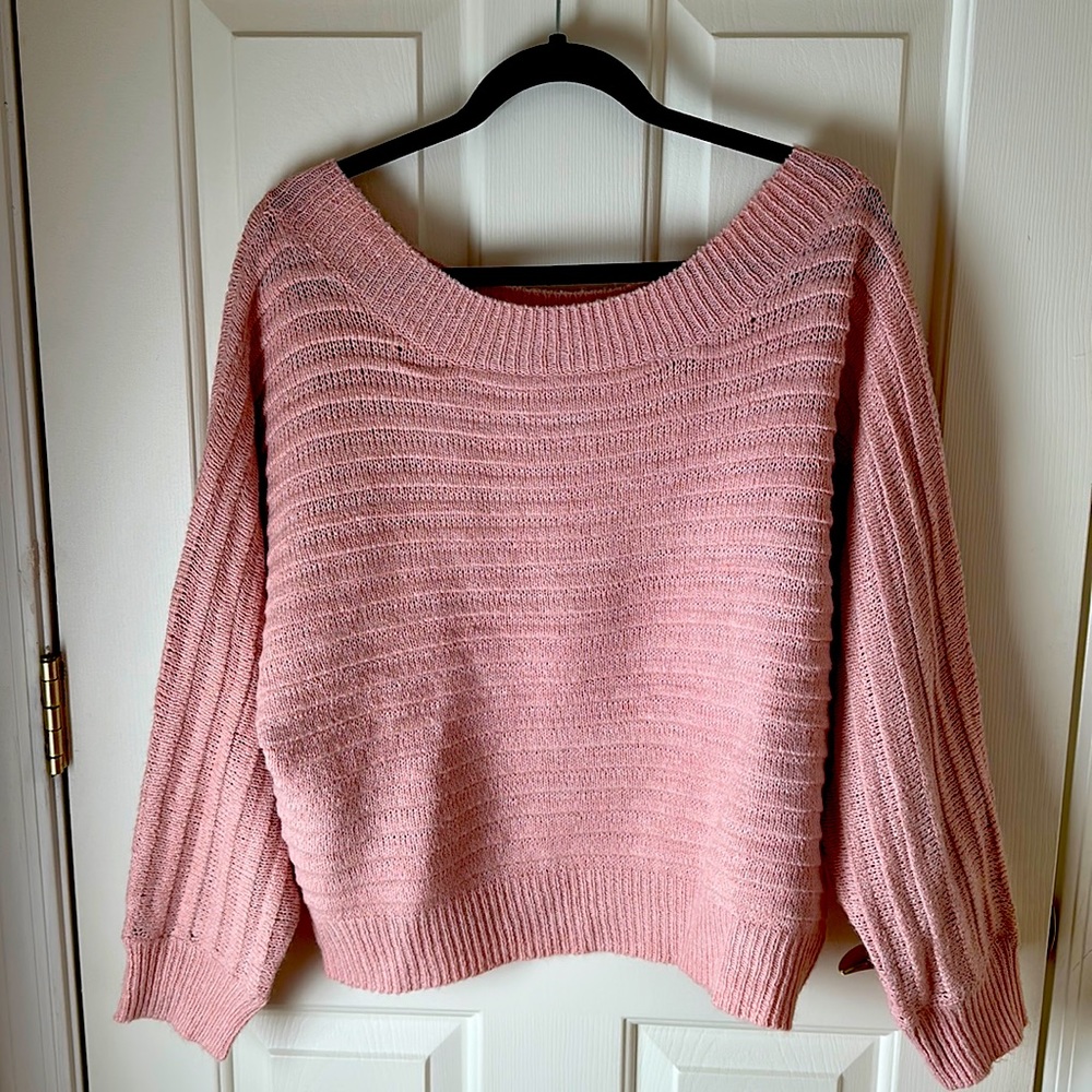 New w/o tags. Pink sweater from Cozy Casual. Can be worn off shoulder.